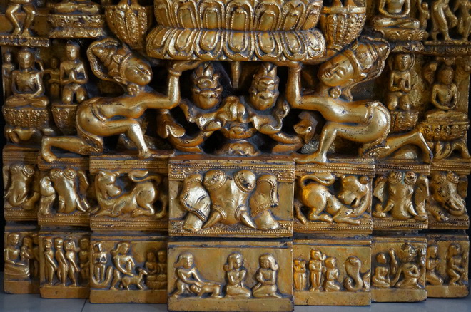 Burmese 1 mtr Gilded Carving - Main Life Events 5 Burmese carving with scenes from the life of Buddha - showing the Naga kings supporting the lotus pedestal
